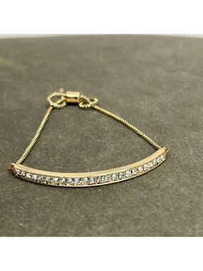 PAVE BAR PULL THROUGH GOLD-TONE CRYSTAL RHINESTONE DIAMANTÉ TENNIS BRACELET